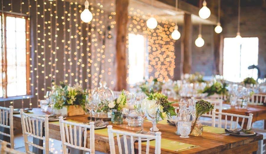 Wedding tables and hanging lights at Kampala
